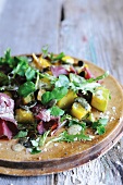 Pumpkin salad with beef and cress