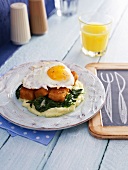 Fish fingers with a fried egg