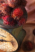 Whole Rambutans on an Old Scale