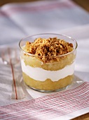 Apple compote with cream and crumbles