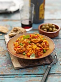 Paella with chicken and prawns