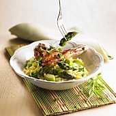 A lamb chop on asparagus risotto