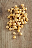 Chickpeas on a wooden surface