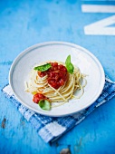 Spaghetti with tomato sauce and basil