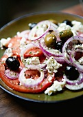 Tomato salad with feta, onions and olives