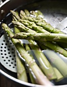 Green asparagus in the cooking water