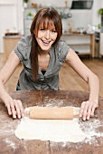 Woman rolling out pastry