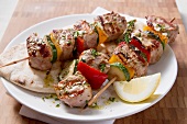 Grilled vegetable and meat kebabs