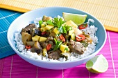 Pork with mango, vegetables and chilli on a bed of rice (Caribbean)