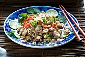 Minced meat salad with onions, pepper and cashew nuts (China)