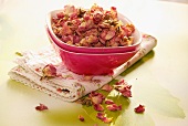 A bowl of dried rose petals