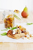 A goat's cheese and walnut sandwich with pear and orange chutney
