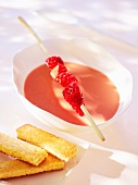 Strawberry and mango cream with a strawberry kebab and sponge fingers