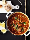 Chickpea soup with chorizo and squid