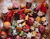Christmas biscuits and fruit dusted with frost