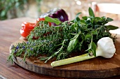An arrangement of herbs, garlic and vegetables