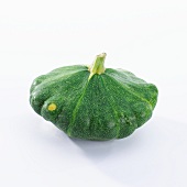 A green pattypan squash