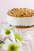 A cream cheese cake topped with crumbles