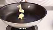 Butter being melted in a pan