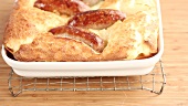 Toad in the hole (sausages in batter, England)