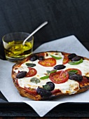 Whole Tomato, Olive and Basil Pizza on Cooling Rack