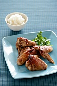 Roast chicken wings in a honey and soy marinade