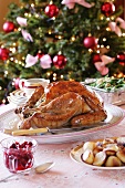 Traditional roast turkey with cranberries and roast potatoes