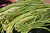 Bundles of Organic Chinese Long Beans on Display at a Farmer's Market