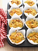 Spicy courgette and cheese muffins in paper cases