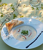 Trout soup with cream and white wine