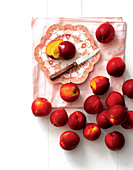 Fresh nectarines, one sliced