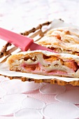 Puff pastry rolls with almonds and plum cream