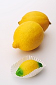 Fresh lemons and a marzipan lemon