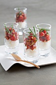 Rice with tomato confit served in glasses as an appetiser