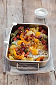 Sausage bake with potatoes, peppers, onions and egg