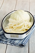 Raw white cabbage, partially chopped