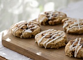 Cinnamon Scones with Icing on Cutting Board