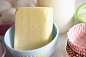 Butter and paper cases for making cupcakes