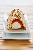 A red pepper filled with goat's cream cheese wrapped in pastry