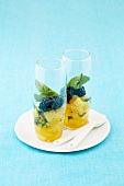 Pineapple compote with mulberries and mint