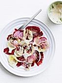 Beef carpaccio with artichokes and radishes