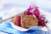 Beef fillets with a red cabbage salad