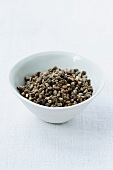 A bowl of cardamom seeds
