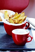 Baked potato wedges and sour cream