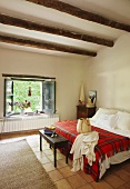 Double bed in country-style bedroom