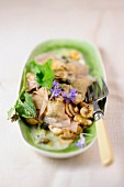 Herb ravioli with mushrooms
