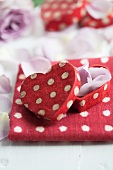 Gift box with rose petals