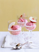 Champagne with sorbet and peach wedges