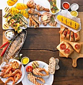 Various barbecue dishes forming a frame