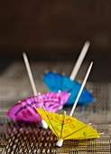 Three cocktail umbrellas